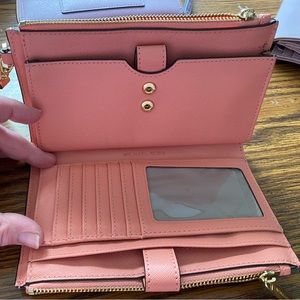 Michael kors zip around wallet like a peach color